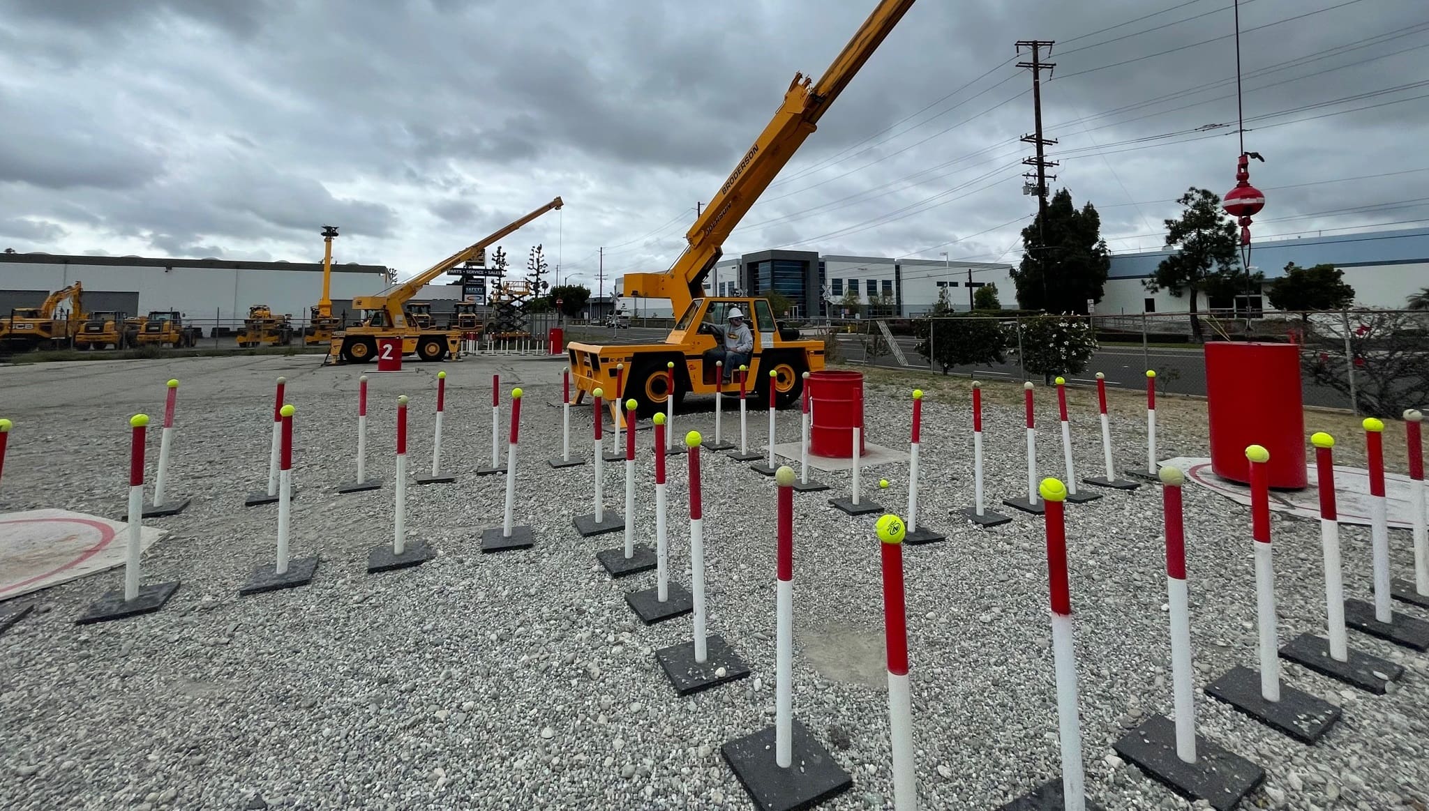crane-operator-navigating-zigzag-course-in-practical-exam-and-barrel-exam crane operator navigating zigzag course in practical exam and barrel exam