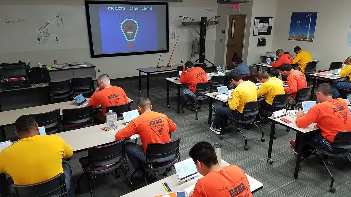 students-in-crane-operator-classroom-studying-for-written-exam students in crane operator classroom studying for written exam